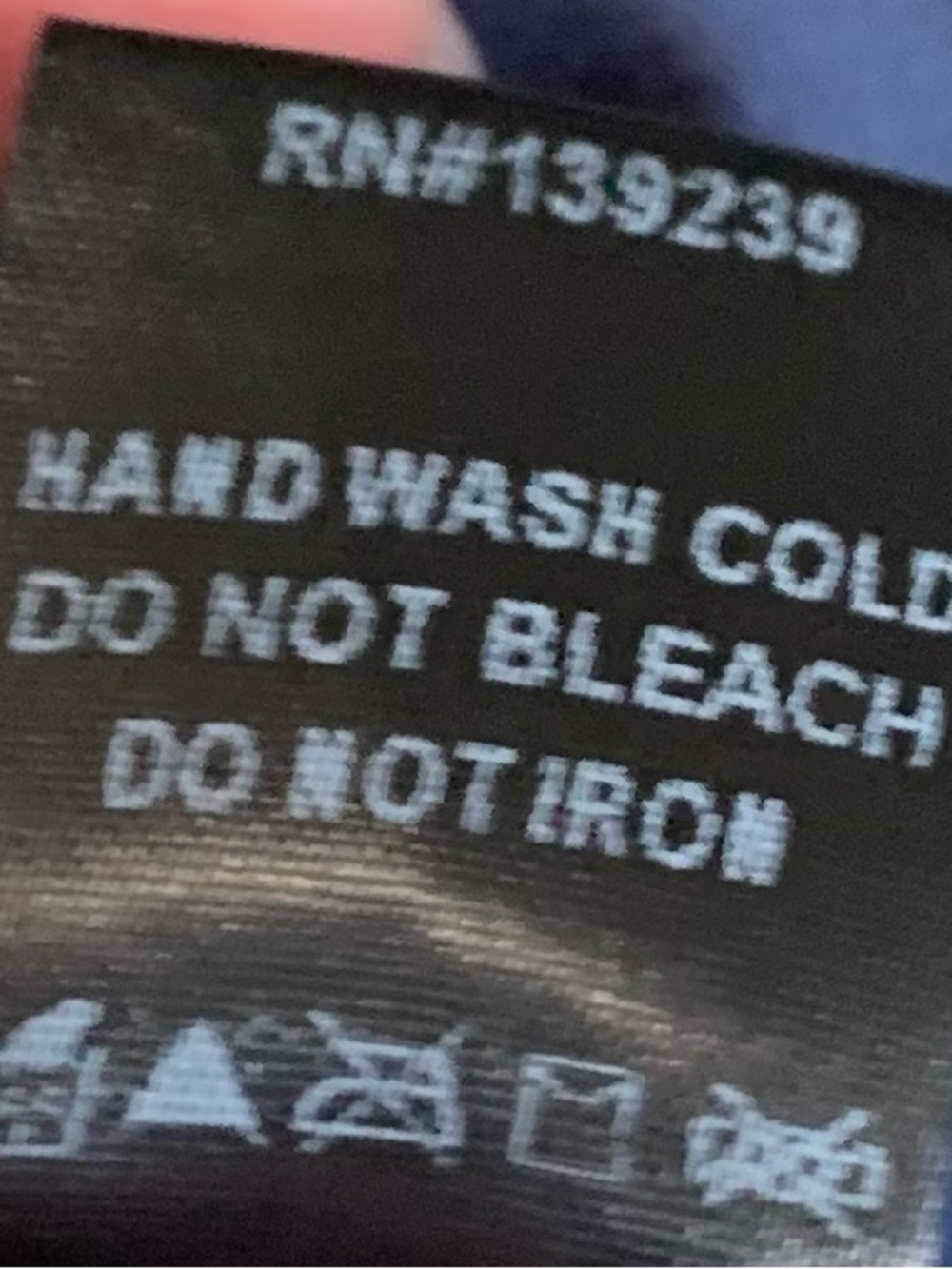 Pomander Place Black Care Label Detail - White Text